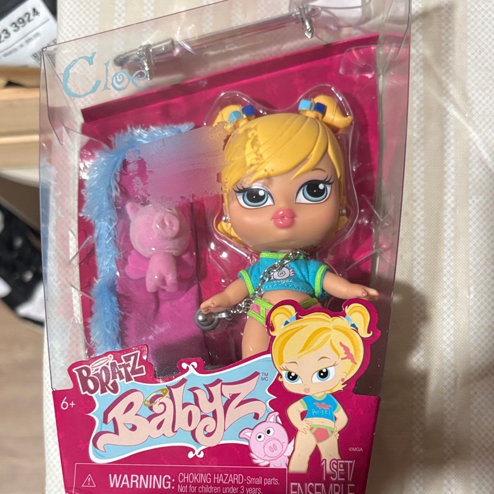 Bratz Babyz Blonde Fashion Doll with Pink Plush Accessory - Bright Pink